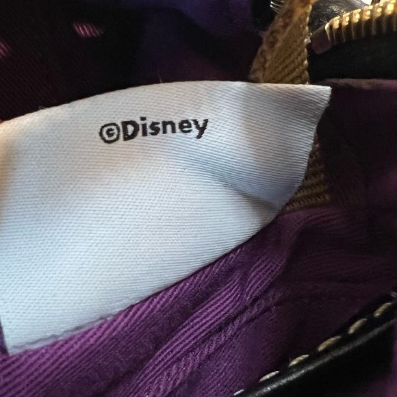 Dooney & Bourke Disney Park
Haunted Mansion 50th
Anniversary Bag Crossbody Purse - Picture 9 of 16